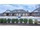 View of the community clubhouse with EV charging station and parking at 4914 Arkose Dr, Raleigh, NC 27610