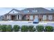 View of the community clubhouse with EV charging station and parking at 4914 Arkose Dr, Raleigh, NC 27610