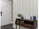 Stylish entryway features modern decor and a board and batten accent wall at 5 Morning Dove Ct, Clayton, NC 27520