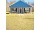 Charming single-story home featuring a welcoming front porch and well-manicured lawn at 5 Morning Dove Ct, Clayton, NC 27520