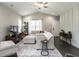 Bright living room with vaulted ceilings, a cozy sectional, and stylish decor at 5 Morning Dove Ct, Clayton, NC 27520