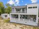 Modern home featuring multiple balconies and an outdoor cooking area at 5217 Tanglewild Dr, Raleigh, NC 27613