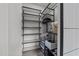 Walk-in closet with custom shelving provides plenty of storage space for organization at 5217 Tanglewild Dr, Raleigh, NC 27613