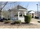 Charming white gazebo nestled in a well-maintained landscaped area near the apartments at 528 Weather Ridge Ln, Cary, NC 27513