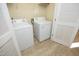 Convenient laundry room with a washer and dryer; perfect for easy chores at 528 Weather Ridge Ln, Cary, NC 27513
