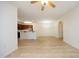 Bright and airy open-concept living space adjacent to a kitchen with breakfast bar at 528 Weather Ridge Ln, Cary, NC 27513
