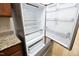 Modern refrigerator with adjustable shelving and door bins providing ample food storage at 528 Weather Ridge Ln, Cary, NC 27513