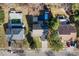 Aerial view of a house with a swimming pool and nice backyard deck at 5401 Green Feather Ln, Raleigh, NC 27604