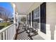 Relaxing front porch featuring rocking chairs and shade, perfect for enjoying the outdoors at 5401 Green Feather Ln, Raleigh, NC 27604