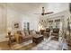 Comfortable living room with coffered ceiling, neutral sofa, and stylish decor at 613 S Fuquay Ave, Fuquay Varina, NC 27526