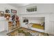 Bright playroom featuring a built-in bed and toy storage at 613 S Fuquay Ave, Fuquay Varina, NC 27526