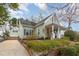Charming exterior view of a well-maintained home with a manicured front yard and inviting curb appeal at 705 Hinsdale St, Raleigh, NC 27605