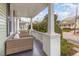 Charming front porch with comfortable seating, perfect for enjoying the neighborhood views at 705 Hinsdale St, Raleigh, NC 27605