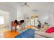 Multi-purpose room features at home office and fitness space with hardwood floors at 705 Hinsdale St, Raleigh, NC 27605