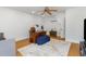 Bright office space featuring hardwood floors, desk with wooden accents, and a ceiling fan at 705 Hinsdale St, Raleigh, NC 27605