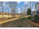 Expansive backyard with views of a greenbelt, perfect for recreation and enjoying nature at 761 Raymond Dr, Clayton, NC 27527