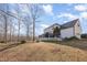 Beautiful backyard featuring a spacious deck and lush greenery, perfect for relaxation and outdoor gatherings at 761 Raymond Dr, Clayton, NC 27527