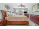 A main bedroom features wood floors, a decorative mirror, and two dressers at 761 Raymond Dr, Clayton, NC 27527