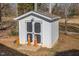 Functional outbuilding on the property with double doors, perfect for storage or a workshop at 761 Raymond Dr, Clayton, NC 27527