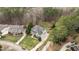 An elevated lot shows a home's relationship to other local real estate and a forest at 7709 Moondance Ct, Wake Forest, NC 27587