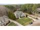 Expansive aerial view of a home nestled on a well-manicured lot with mature trees at 7709 Moondance Ct, Wake Forest, NC 27587