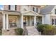 A welcoming column-supported porch invites visitors to rest and enter the property at 7709 Moondance Ct, Wake Forest, NC 27587