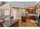 Modern kitchen with granite countertops, stainless steel appliances, and a functional center island at 7709 Moondance Ct, Wake Forest, NC 27587
