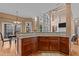 Open kitchen with granite countertops and lots of natural light from the large windows at 7709 Moondance Ct, Wake Forest, NC 27587