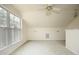 Bright bonus room with large windows and neutral carpet is ready for its new owner at 104 Hickory Glen Ln, Durham, NC 27703