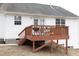 This deck features a grill and outdoor seating, perfect for enjoying backyard meals and gatherings at 104 Hickory Glen Ln, Durham, NC 27703