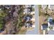 A high-angle aerial perspective showcases the property's location in a tree-lined, residential neighborhood at 105 Palladium Ct, Elon, NC 27244