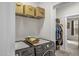 Laundry area with a modern washer and dryer and ample storage space at 105 Palladium Ct, Elon, NC 27244