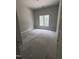 A bright bedroom offers large windows and ample natural light at 108 Pointe Park Cir, Holly Springs, NC 27540