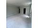 Spacious bedroom boasting crown molding and multiple windows at 108 Pointe Park Cir, Holly Springs, NC 27540