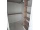 A closet with shelves maximizes storage capacity and provides organized space at 108 Pointe Park Cir, Holly Springs, NC 27540