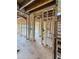 Interior view of home under construction with visible framework and staircase access at 108 Pointe Park Cir, Holly Springs, NC 27540