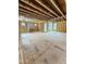 Interior view of the home's layout with a doorway and windows framed in lumber at 108 Pointe Park Cir, Holly Springs, NC 27540