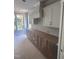 Kitchen featuring crisp white cabinets and stainless steel appliances at 108 Pointe Park Cir, Holly Springs, NC 27540