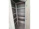 Walk-in pantry featuring custom shelving perfect for organization and storage at 108 Pointe Park Cir, Holly Springs, NC 27540