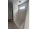 This bathroom has a tiled shower with a built-in bench and a small window at 108 Pointe Park Cir, Holly Springs, NC 27540