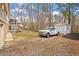 The backyard features a fenced in space, a detached storage shed, and a detached garage at 1203 Brookgreen Dr, Cary, NC 27511