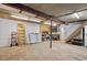 Spacious basement featuring laundry area, workbench, and ample storage space at 1203 Brookgreen Dr, Cary, NC 27511