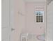 Pink half bath with window and shower at 1225 Perry Bluff Dr, Wake Forest, NC 27587