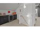 Bonus room features a wet bar, built-in shelving, and staircase at 1225 Perry Bluff Dr, Wake Forest, NC 27587