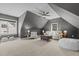 Cozy bonus room with neutral tones, comfortable seating, and a ceiling fan at 1225 Perry Bluff Dr, Wake Forest, NC 27587