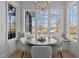 Bright breakfast nook featuring a large window with views of the surrounding landscape at 1225 Perry Bluff Dr, Wake Forest, NC 27587