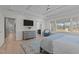 Stylish main bedroom featuring a cozy sitting area, dresser, and access to the bathroom at 1225 Perry Bluff Dr, Wake Forest, NC 27587