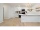 Chic kitchen boasting white cabinetry and stainless steel appliances at 130 S Estes Dr # F6, Chapel Hill, NC 27514