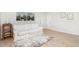 Comfortable living room with a white sofa and natural light at 130 S Estes Dr # F6, Chapel Hill, NC 27514
