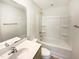 Clean bathroom with a shower-tub combo, neutral finishes, a single sink vanity, and modern fixtures at 135 N Ridge View Way, Franklinton, NC 27525